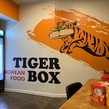 Tiger Box - a tiger on the wall of a korean food restaurant - Korean Near Me - Brooklyn, New York