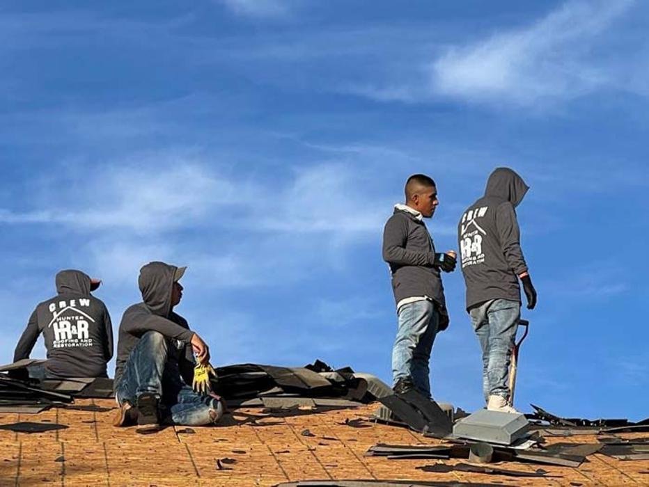 Slide of Hunter Roofing & Restoration