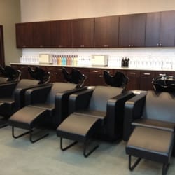 The Hair District Collective Burnsville - Comfy shampoo chairs with footstools!