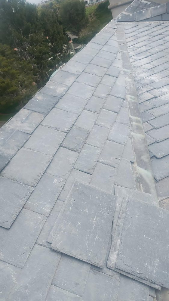 Slide of Ahn Top Roofing