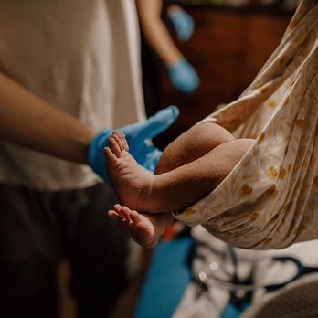 North Texas Midwifery - Weighing a newborn - Midwives Near Me - Dallas, Texas North Texas Midwifery - Weighing a newborn - Midwives Near Me - Dallas, Texas