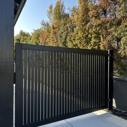 The Iron Guy - Aluminum swinging gate with an LiftMaster LA 500 operator in Burbank, California.