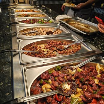 Flaming Buffet - a variety of food being served at a buffet - Seafood Near Me - Fullerton, California Flaming Buffet - a variety of food being served at a buffet - Seafood Near Me - Fullerton, California