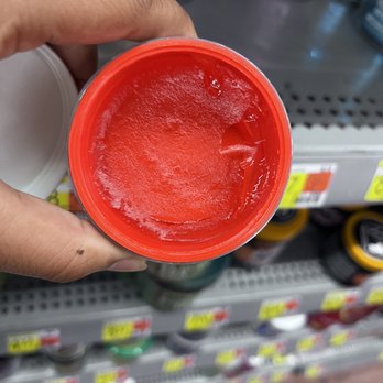 Walmart Supercenter - a hand holding a container of red liquid - Department Stores Near Me - Manteca, California Walmart Supercenter - a hand holding a container of red liquid - Department Stores Near Me - Manteca, California