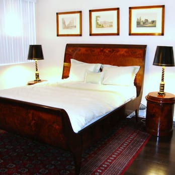 Vienna Woods - Sleigh bed with matching round bedside lamp tables, and Vienna Woods Biedermeier style frames displaying classic prints. - Furniture Stores Near Me - Los Angeles, California Vienna Woods - Sleigh bed with matching round bedside lamp tables, and Vienna Woods Biedermeier style frames displaying classic prints. - Furniture Stores Near Me - Los Angeles, California
