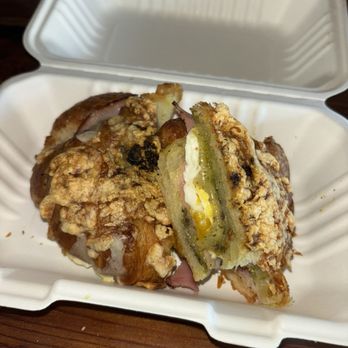 Taylor Lane Organic Coffee - Ham and cheese egg sandwich on a pesto cheese croissant - Coffee Roasteries Near Me - Sebastopol, California Taylor Lane Organic Coffee - Ham and cheese egg sandwich on a pesto cheese croissant - Coffee Roasteries Near Me - Sebastopol, California