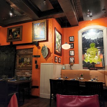 Las Bugambilias - a dining room with orange walls - Mexican Near Me - Philadelphia, Pennsylvania Las Bugambilias - a dining room with orange walls - Mexican Near Me - Philadelphia, Pennsylvania