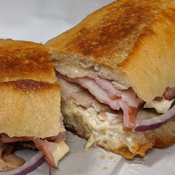 Gateway Market - Pork Belly Cubano with smoked ham, smoked pork belly, Swiss, pickle, onion, mayo, mustard, on a grilled baguette. - Grocery Near Me - Des Moines, Iowa Gateway Market - Pork Belly Cubano with smoked ham, smoked pork belly, Swiss, pickle, onion, mayo, mustard, on a grilled baguette. - Grocery Near Me - Des Moines, Iowa