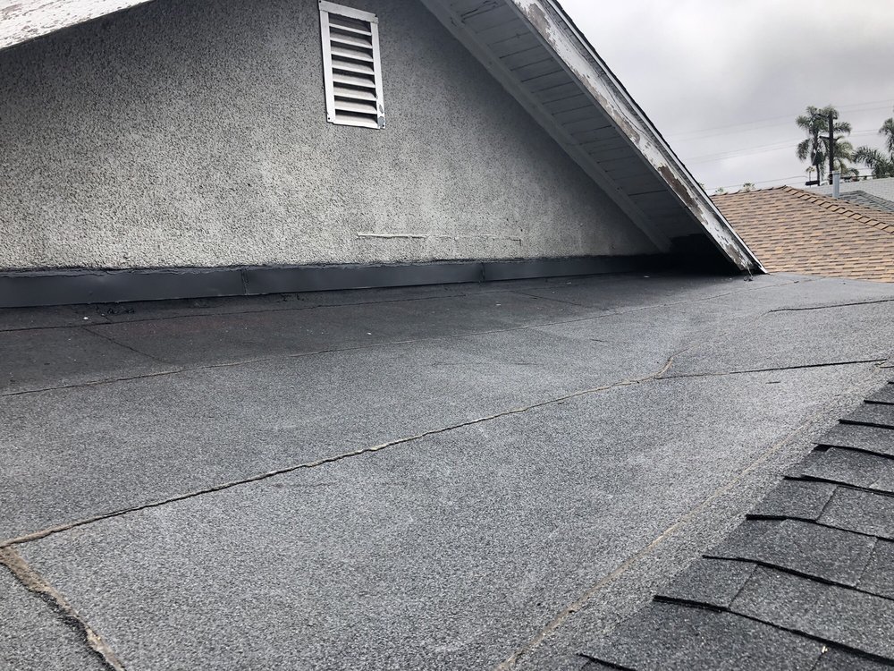 Slide of Kennedy Roofing