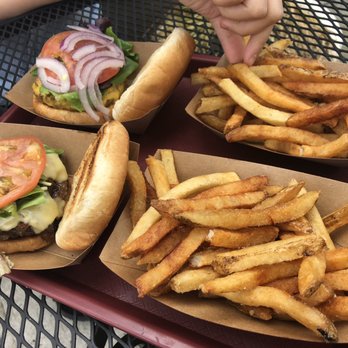 418 Burgers - Cheddar cheese burger (back), swiss cheese burger (front) and lots of fries! - American Near Me - Highland Park, New Jersey 418 Burgers - Cheddar cheese burger (back), swiss cheese burger (front) and lots of fries! - American Near Me - Highland Park, New Jersey