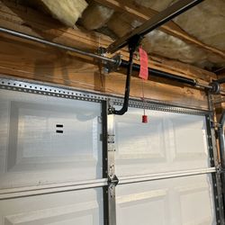 Good Shepherd Garage Door - Replaced spring for garage door