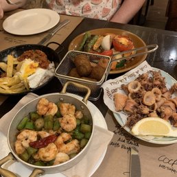 Shrimp and asparagus, chorizo and fries, calamari, veggies