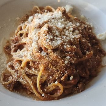 Oliva Trattoria - Spaghetti bolognese with paramesan cheese on top - Pizza Near Me - Sherman Oaks, California Oliva Trattoria - Spaghetti bolognese with paramesan cheese on top - Pizza Near Me - Sherman Oaks, California