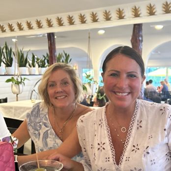 Porto Bello - Enjoying cocktails at the bar before dinner. - Italian Near Me - Greenport, New York
