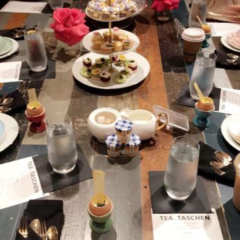 The TASCHEN Library - Table set up - Bookstores Near Me - Dallas, Texas The TASCHEN Library - Table set up - Bookstores Near Me - Dallas, Texas