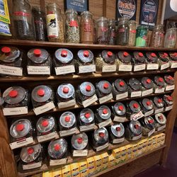 Vices & Spices From Around the World - Wall of loose leaf teas
