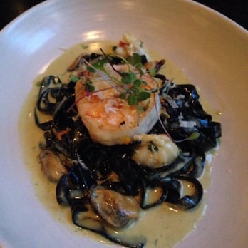 Cento - black tagliatelle with lobster, prawn, mussels, lobster sauce and fresh horseradish - Italian Near Me - Madison, Wisconsin