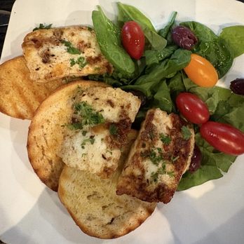 Joseph’s Table - Grilled Halloumi (sturdy, mild cheese) on butter-grilled crostini w/spinach, tomatoes and Greek olives. - Mediterranean Near Me - Birmingham, Alabama Joseph’s Table - Grilled Halloumi (sturdy, mild cheese) on butter-grilled crostini w/spinach, tomatoes and Greek olives. - Mediterranean Near Me - Birmingham, Alabama