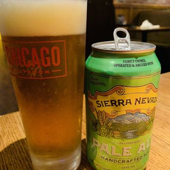 Old Chicago Pizza + Taproom - a glass of beer and a can - American Near Me - EDEN PRAIRIE, Minnesota Old Chicago Pizza + Taproom - a glass of beer and a can - American Near Me - EDEN PRAIRIE, Minnesota