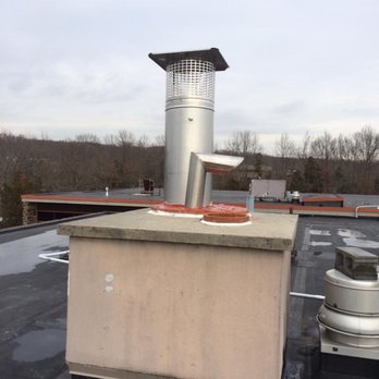 Mark Jameson Chimney Contractors - a chimney on a roof - Chimney Sweeps Near Me - Maplewood, New Jersey Mark Jameson Chimney Contractors - a chimney on a roof - Chimney Sweeps Near Me - Maplewood, New Jersey