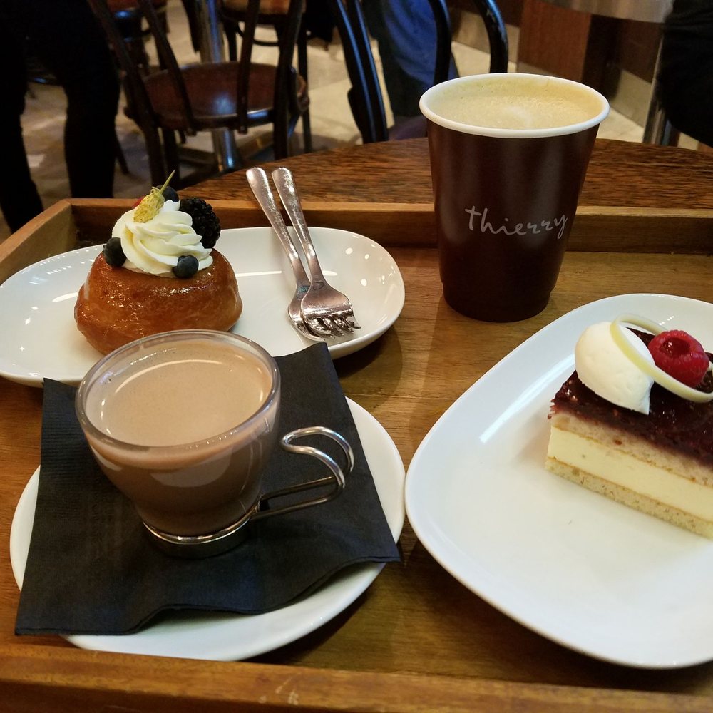 Thierry - Liquid chocolate house blend, savarin, raspberry white chocolate cake, and coffee - Patisserie/Cake Shop Near Me - Vancouver, British Columbia Thierry - Liquid chocolate house blend, savarin, raspberry white chocolate cake, and coffee - Patisserie/Cake Shop Near Me - Vancouver, British Columbia