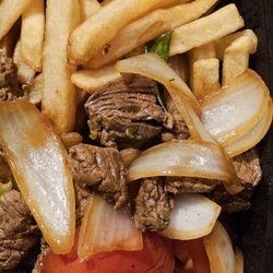 Inka Grill - Lomo Saltado. The meat is so tender, tasty, and juicy.