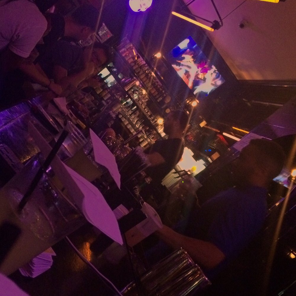 Chilo's - The bar in the evening. I dare you to challenge Johnny (blue shirt) to a chess match at the bar. - Bars Near Me - Brooklyn, New York Chilo's - The bar in the evening. I dare you to challenge Johnny (blue shirt) to a chess match at the bar. - Bars Near Me - Brooklyn, New York