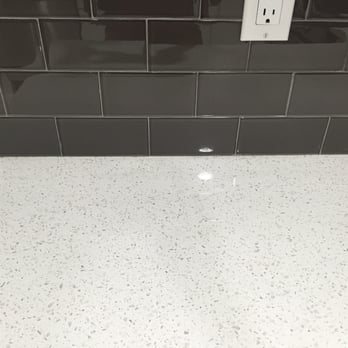 Redesign Construction - After - close up of Quartz countertop and subway tiles. - General Contractors Near Me - Garden Grove, California Redesign Construction - After - close up of Quartz countertop and subway tiles. - General Contractors Near Me - Garden Grove, California