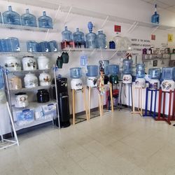 The Water Stop - 1/2-5gl Bottles, Crocks, Stands