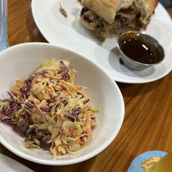 Toast & Jam - Pulled Pork Sandwich (special) with slaw on the side and an extra side of sauce. - Pubs Near Me - Clallam Bay, Washington Toast & Jam - Pulled Pork Sandwich (special) with slaw on the side and an extra side of sauce. - Pubs Near Me - Clallam Bay, Washington