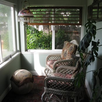 The Desmond House Bed & Breakfast - Seating area on front, enclosed, porch. - Bed & Breakfast Near Me - Redding, California