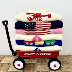 The Red Wagon - Our classic roll neck sweaters make the perfect gift! We have so many different designs to choose from.