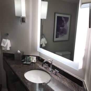 Hilton Long Beach - Updated bathroom with granite countertops. - Hotels Near Me - Long Beach, California Hilton Long Beach - Updated bathroom with granite countertops. - Hotels Near Me - Long Beach, California