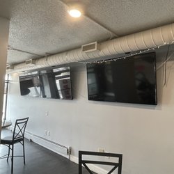 Syps Grille - Can't wait to see what they put on these 3 screens once happy hour starts and the weather gets nicer!