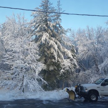 Supreme Landscaping - a snow plow clearing the road - Landscaping Near Me - Londonderry, New Hampshire Supreme Landscaping - a snow plow clearing the road - Landscaping Near Me - Londonderry, New Hampshire