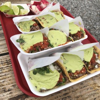 Tacos La Central - Carne asada tacos with everything on it (onion, cilantro, salsa and ALOT of guacamole!) - Mexican Near Me - Colton, California Tacos La Central - Carne asada tacos with everything on it (onion, cilantro, salsa and ALOT of guacamole!) - Mexican Near Me - Colton, California