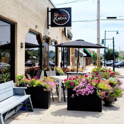 Sushi Karma - Asian Bistro & Bar - The patio got a little glow up with all these flowers!
