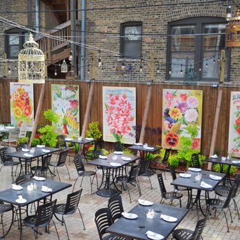 Lark - This spacious and beautiful patio was is a surprise in the heart of Lakeview. I took this photo just after they opened for brunch. - Pizza Near Me - Chicago, Illinois Lark - This spacious and beautiful patio was is a surprise in the heart of Lakeview. I took this photo just after they opened for brunch. - Pizza Near Me - Chicago, Illinois
