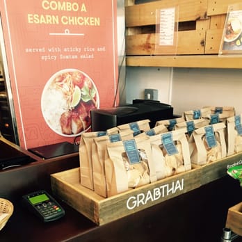 GRABTHAI - Bangkok Cafe - Counter display of crackers. Tempting. - Thai Near Me - London, XGL GRABTHAI - Bangkok Cafe - Counter display of crackers. Tempting. - Thai Near Me - London, XGL