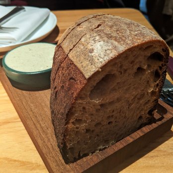 Rolf and Daughters - Sourdough bread with seaweed butter - New American Near Me - Nashville, Tennessee Rolf and Daughters - Sourdough bread with seaweed butter - New American Near Me - Nashville, Tennessee