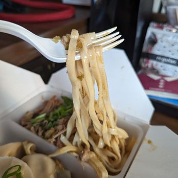 Three Fold Noodles and Dumpling - Half & Half, $13.89: two half size portions of signature noodles & dumpling bowl, shown with pork - Chinese Near Me - Little Rock, Arkansas Three Fold Noodles and Dumpling - Half & Half, $13.89: two half size portions of signature noodles & dumpling bowl, shown with pork - Chinese Near Me - Little Rock, Arkansas