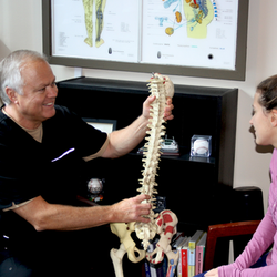 Sheldon Chiropractic & Wellness - Dr. Sheldon explaining subluxations in the spine.