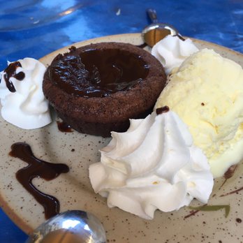 Chez ma cousine - Chocolate fondant with vanilla ice cream - Salad Near Me - Geneva, GE Chez ma cousine - Chocolate fondant with vanilla ice cream - Salad Near Me - Geneva, GE