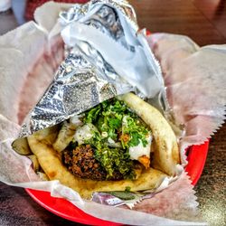 Falafel Sandwich: Roasted eggplant spread, hummus, piaz beans and tahini.  $12.95