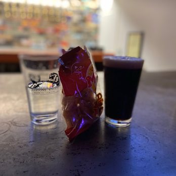 Tin Man - a glass of beer and a candy bar - Beer Bar Near Me - El Paso, Texas Tin Man - a glass of beer and a candy bar - Beer Bar Near Me - El Paso, Texas