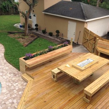 Grass Roots Outdoors - Patio deck and built in fire table and fence replacement and sod replacement and tree trimming and integrated planter boxes - Irrigation Near Me - Orlando, Florida Grass Roots Outdoors - Patio deck and built in fire table and fence replacement and sod replacement and tree trimming and integrated planter boxes - Irrigation Near Me - Orlando, Florida