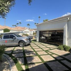 Ramirez’s Discount Garage Doors - Bronze glass with black frame full view glass door.