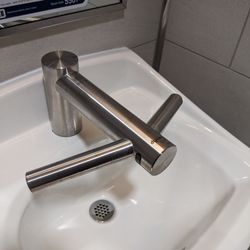 Northwest Hospital - This fancy faucet had the hand dryer built in! Those side arms are dryers.