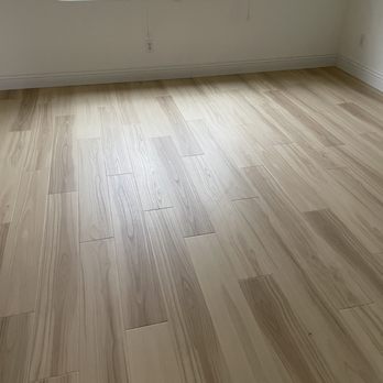 Metro Flooring - a hardwood floor in an empty room - Flooring Near Me - San Diego, California Metro Flooring - a hardwood floor in an empty room - Flooring Near Me - San Diego, California
