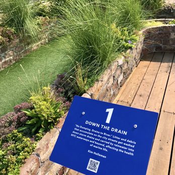 Putting Green - Each course has a sign! Scan the code to learn more! - Mini Golf Near Me - Brooklyn, New York